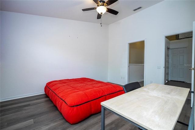 3567 Shallot Dr Unit 103, Orlando, FL 32835 - bedroom with wood finished floors, baseboards, and a ceiling fan