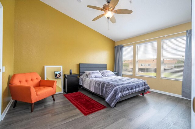 3567 Shallot Dr Unit 103, Orlando, FL 32835 - bedroom featuring vaulted ceiling, wood finished floors, baseboards, and a ceiling fan