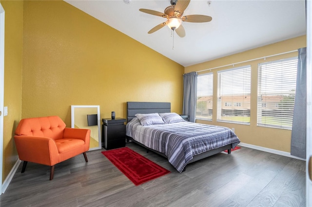 3567 Shallot Dr Unit 103, Orlando, FL 32835 - bedroom featuring lofted ceiling, wood finished floors, baseboards, and a ceiling fan