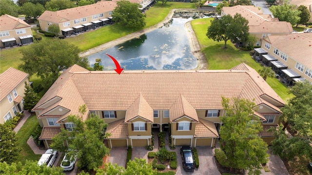 3567 Shallot Dr Unit 103, Orlando, FL 32835 - aerial view of property and surrounding area with a nearby body of water