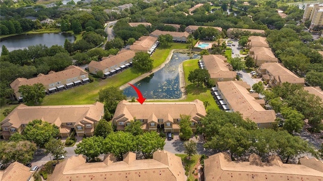 3567 Shallot Dr Unit 103, Orlando, FL 32835 - aerial perspective of suburban area with a nearby body of water