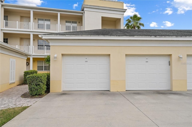7509 Mourning Dove Cir Unit 203, Reunion, FL 34747 - garage with driveway