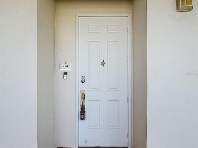7509 Mourning Dove Cir Unit 203, Reunion, FL 34747 - entrance to property with stucco siding