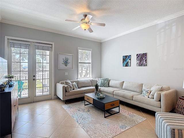 7509 Mourning Dove Cir Unit 203, Reunion, FL 34747 - living area featuring light tile patterned flooring, a textured ceiling, french doors, a ceiling fan, and ornamental molding