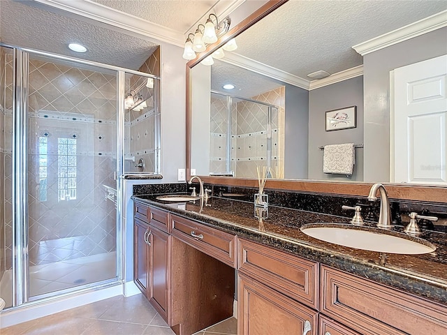 7509 Mourning Dove Cir Unit 203, Reunion, FL 34747 - bathroom with a sink, tile patterned flooring, and a textured ceiling
