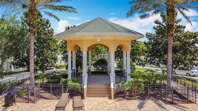 7509 Mourning Dove Cir Unit 203, Reunion, FL 34747 - view of patio featuring fence and a gazebo