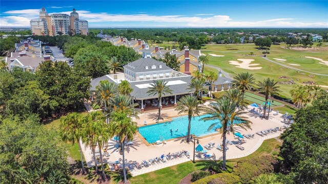 7509 Mourning Dove Cir Unit 203, Reunion, FL 34747 - drone / aerial view with view of golf course