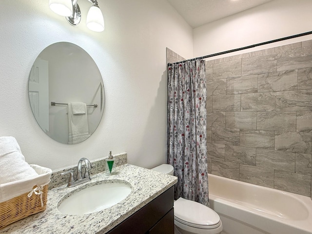 full bathroom featuring toilet, shower / bath combination with curtain, and vanity