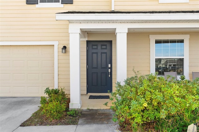 740 Simone Ct, Haines City, FL 33844 - doorway to property featuring a garage