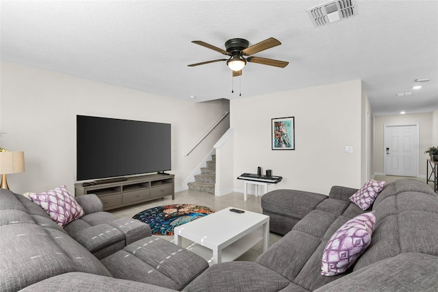 740 Simone Ct, Haines City, FL 33844 - living area with ceiling fan, recessed lighting, baseboards, visible vents, and stairway
