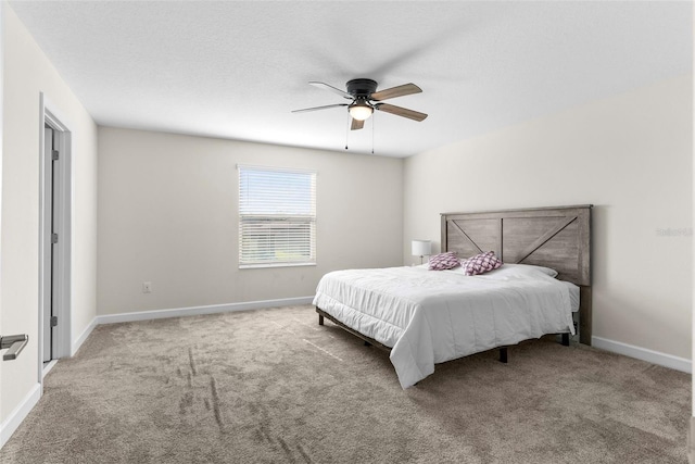 740 Simone Ct, Haines City, FL 33844 - carpeted bedroom featuring baseboards and a ceiling fan