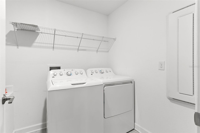 740 Simone Ct, Haines City, FL 33844 - washroom featuring laundry area, baseboards, and washer and dryer