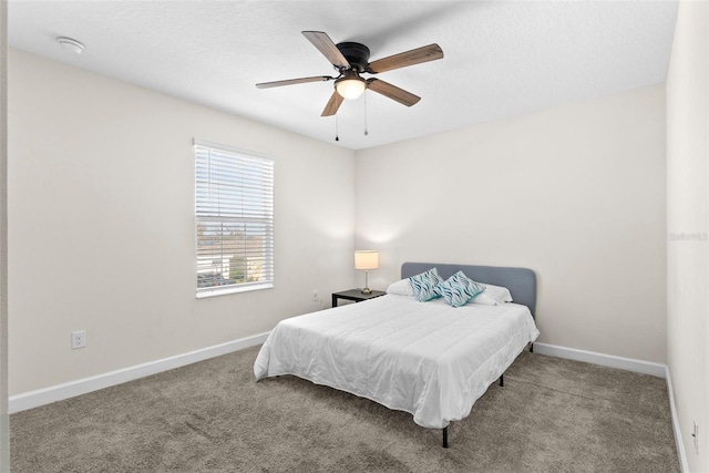 740 Simone Ct, Haines City, FL 33844 - bedroom with baseboards, ceiling fan, and carpet flooring