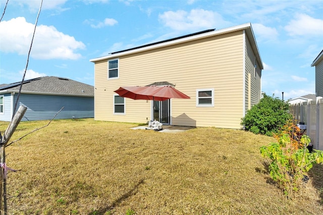 740 Simone Ct, Haines City, FL 33844 - back of property with fence and a yard