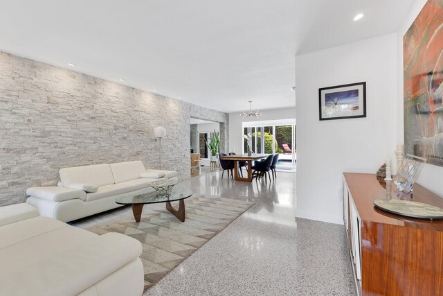 2525 Venetian Way, Winter Park, FL 32789 - living area with baseboards, recessed lighting, speckled floor, and a notable chandelier