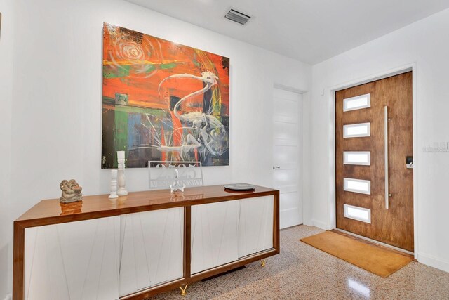 2525 Venetian Way, Winter Park, FL 32789 - foyer entrance featuring baseboards, speckled floor, and visible vents