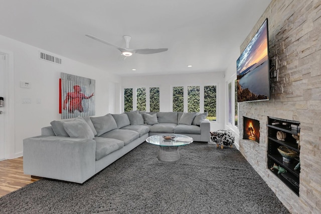 2525 Venetian Way, Winter Park, FL 32789 - living area featuring a ceiling fan, recessed lighting, a stone fireplace, and visible vents