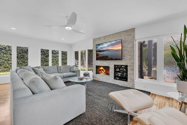 2525 Venetian Way, Winter Park, FL 32789 - living room with recessed lighting, ceiling fan, wood finished floors, and a fireplace