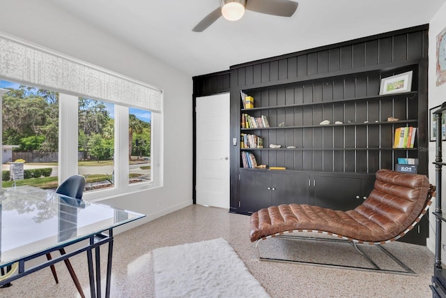 2525 Venetian Way, Winter Park, FL 32789 - home office featuring baseboards, a ceiling fan, speckled floor, and built in shelves
