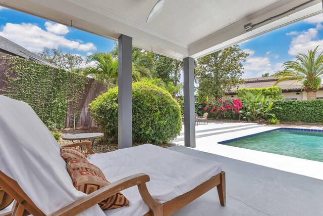 2525 Venetian Way, Winter Park, FL 32789 - view of patio / terrace with a fenced backyard and a fenced in pool