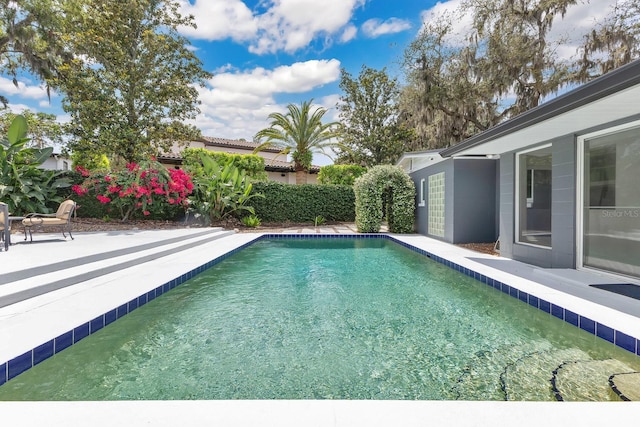 2525 Venetian Way, Winter Park, FL 32789 - outdoor pool with a patio