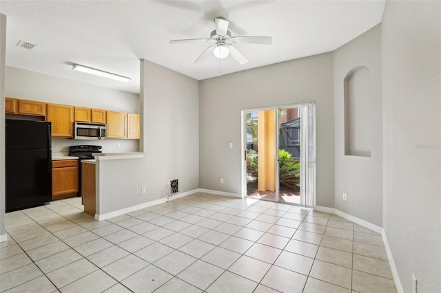 kitchen featuring visible vents, light tile patterned flooring, ceiling fan, light countertops, and black appliances