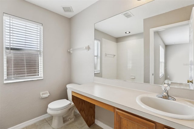 full bath featuring tile patterned flooring, vanity, toilet, baseboards, and visible vents