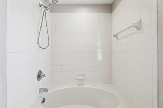 bathroom with shower / bathing tub combination