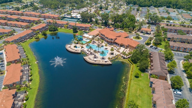 bird's eye view featuring a residential view and a water view