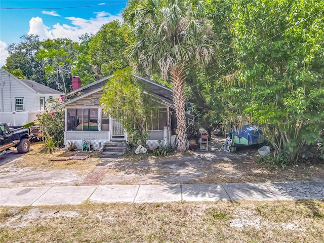 1314 S Mellonville Ave, Sanford, FL 32771 - view of front of house featuring a chimney