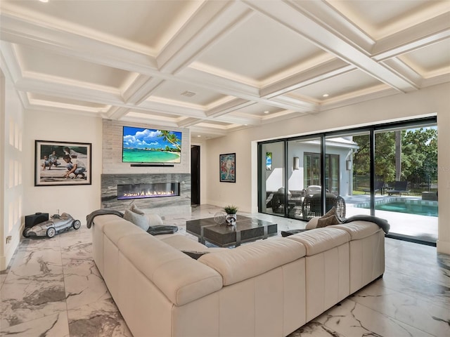 living area featuring a large fireplace, beam ceiling, and marble finish floor