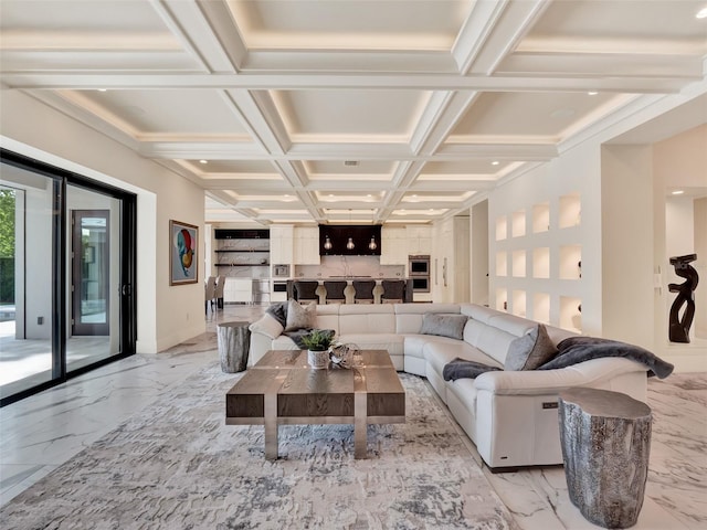 living room featuring coffered ceiling and marble finish floor