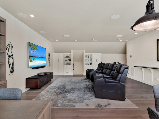 living room with baseboards, recessed lighting, wood finished floors, and lofted ceiling