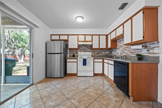 130 Kristi Ann Ct, Winter Springs, FL 32708 - kitchen with visible vents, freestanding refrigerator, electric range, black dishwasher, and under cabinet range hood