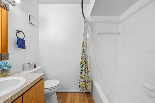 130 Kristi Ann Ct, Winter Springs, FL 32708 - full bath featuring wood finished floors, vanity, baseboards, toilet, and shower / bathtub combination with curtain