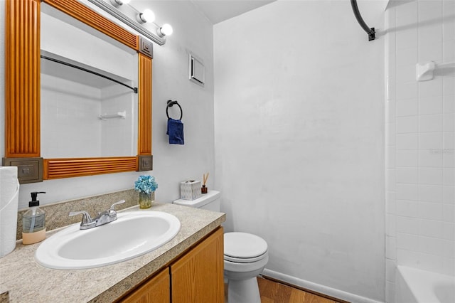 130 Kristi Ann Ct, Winter Springs, FL 32708 - full bathroom with shower / tub combination, wood finished floors, vanity, baseboards, and toilet