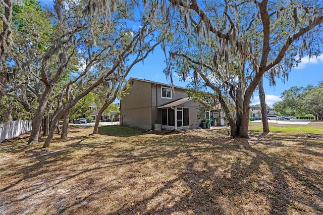 130 Kristi Ann Ct, Winter Springs, FL 32708 - view of yard with fence and a sunroom