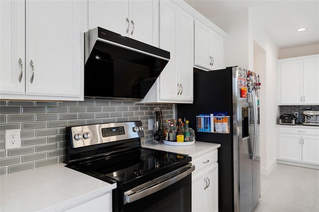 kitchen with backsplash, range with electric cooktop, white cabinetry, stainless steel fridge, and extractor fan