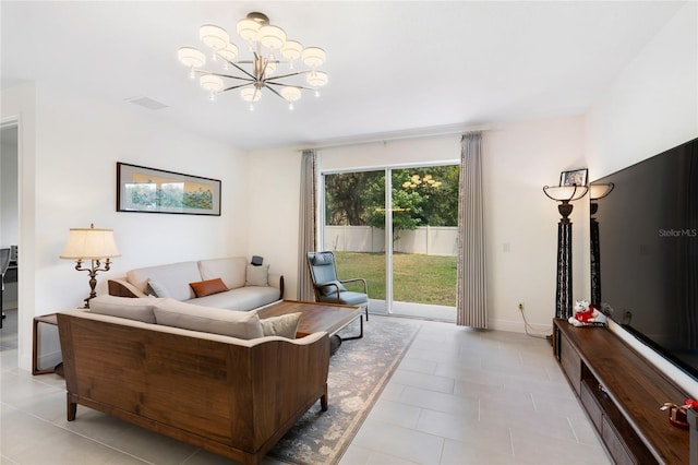 living room with an inviting chandelier, baseboards, light tile patterned flooring, and visible vents