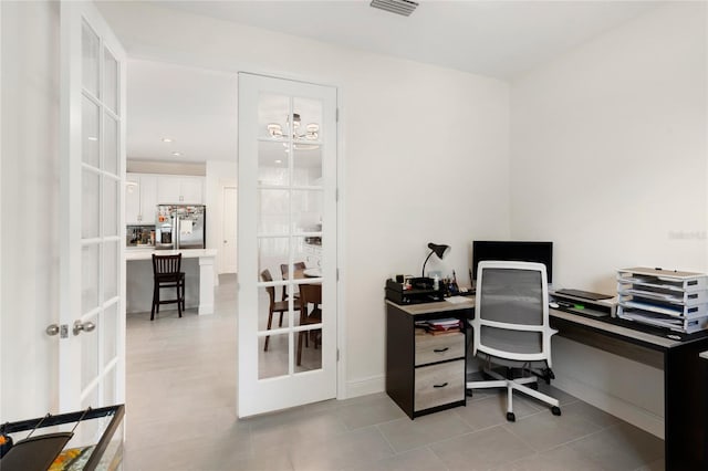 home office featuring baseboards, french doors, visible vents, and light tile patterned floors