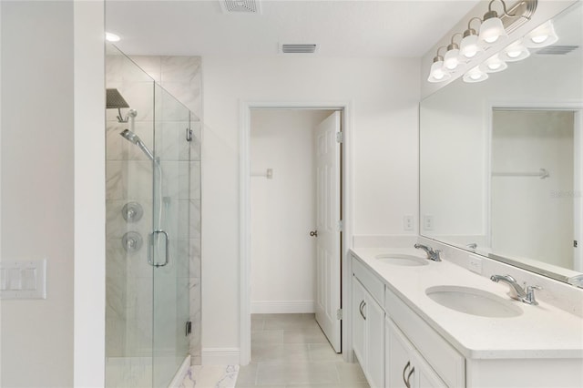 full bath with visible vents, a sink, and a stall shower