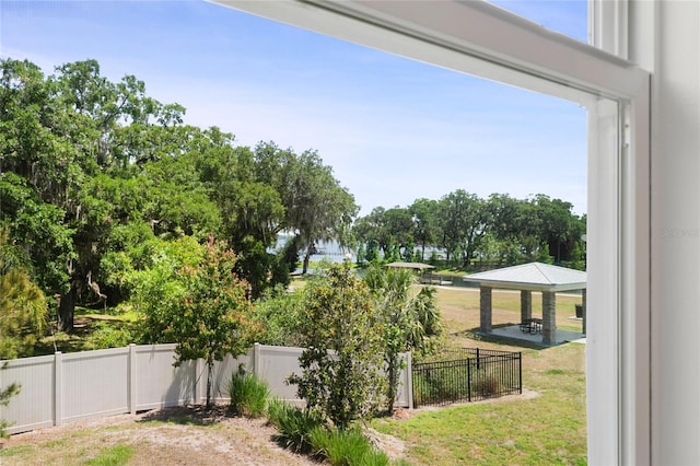 view of yard featuring a gazebo and fence