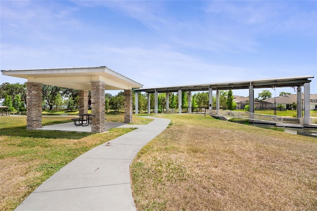 view of community featuring a lawn
