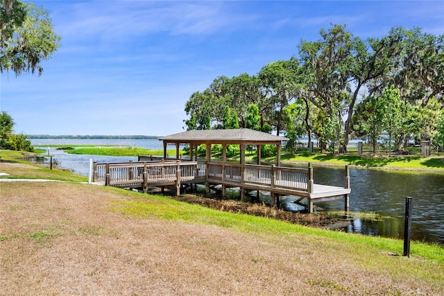 view of dock with a water view and a gazebo