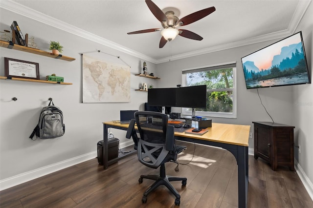 office area with crown molding, a ceiling fan, baseboards, and dark wood finished floors