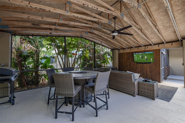 view of patio / terrace featuring a ceiling fan, outdoor dining area, and a grill