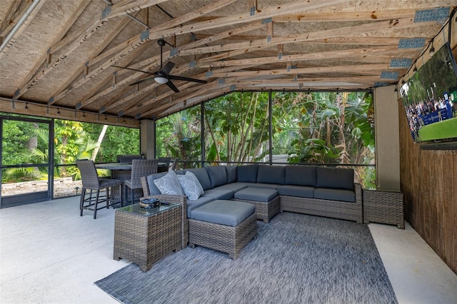 view of patio with an outdoor living space and a ceiling fan