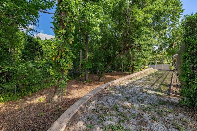 view of yard with fence