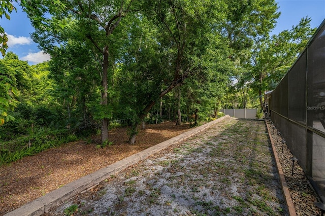 view of yard featuring fence
