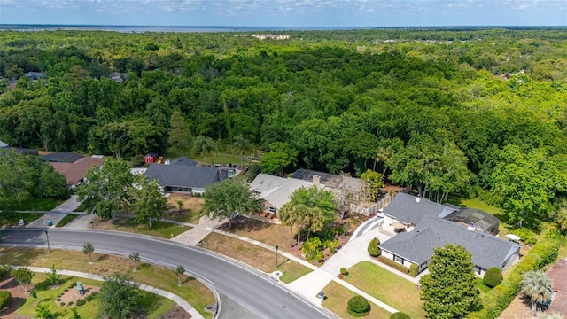 bird's eye view with a residential view and a forest view